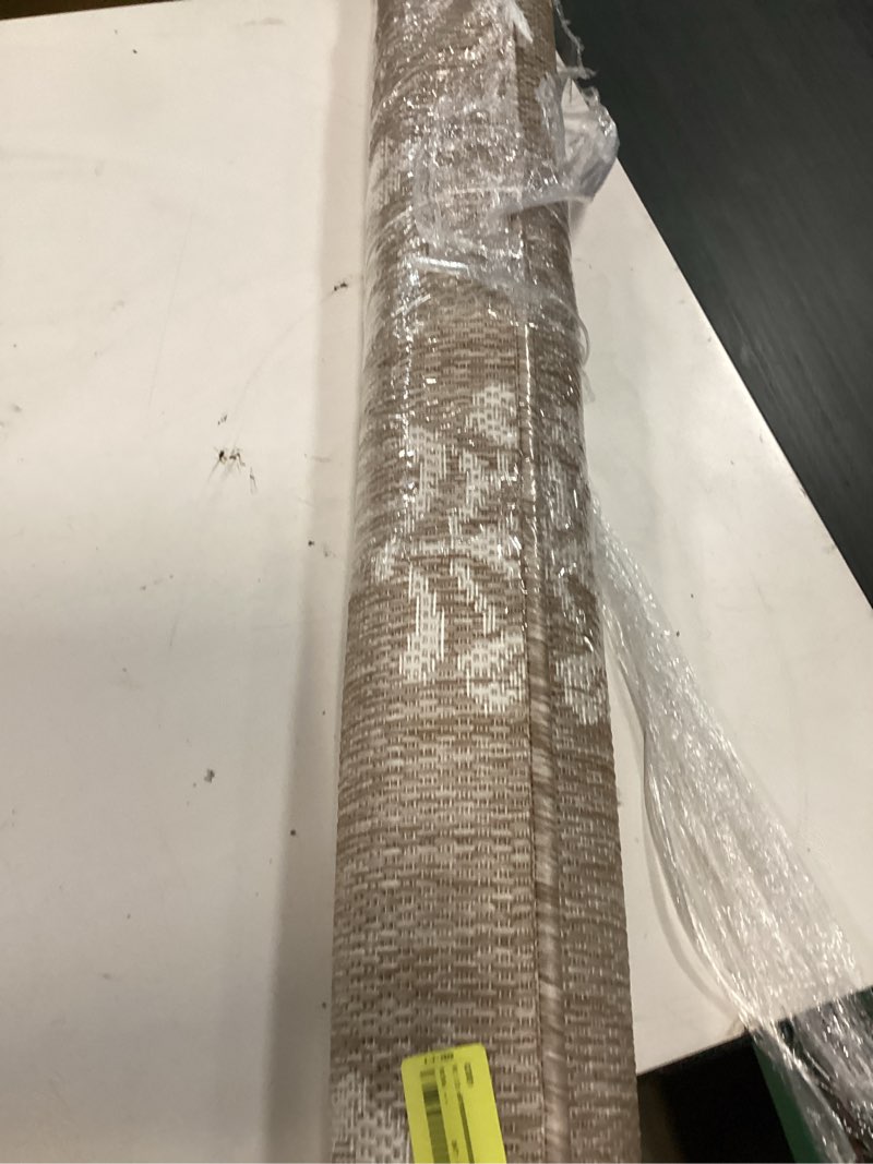 Condition photo showing New/Like New for hauteloom eris outdoor area rug - outside porch patio rug carpet - no pile rug - waterproof rug - geometric - brown, cream, beige - 5'3" x 7'7" 5'3" x 7'7" (rectangular) beige, dark brown, medium gray / deneysville