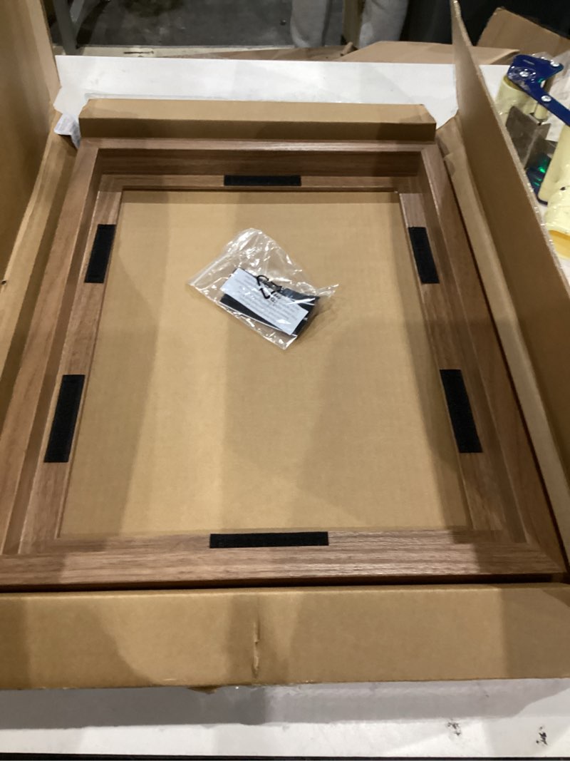 Condition photo showing Good Condition for mcs canvas float frames 12x16 frame, walnut woodgrain for finished canvases, vertical & horizontal wall hanging with adhesive for canvas paintings (1-pack) 12x16 without mat walnut woodgrain