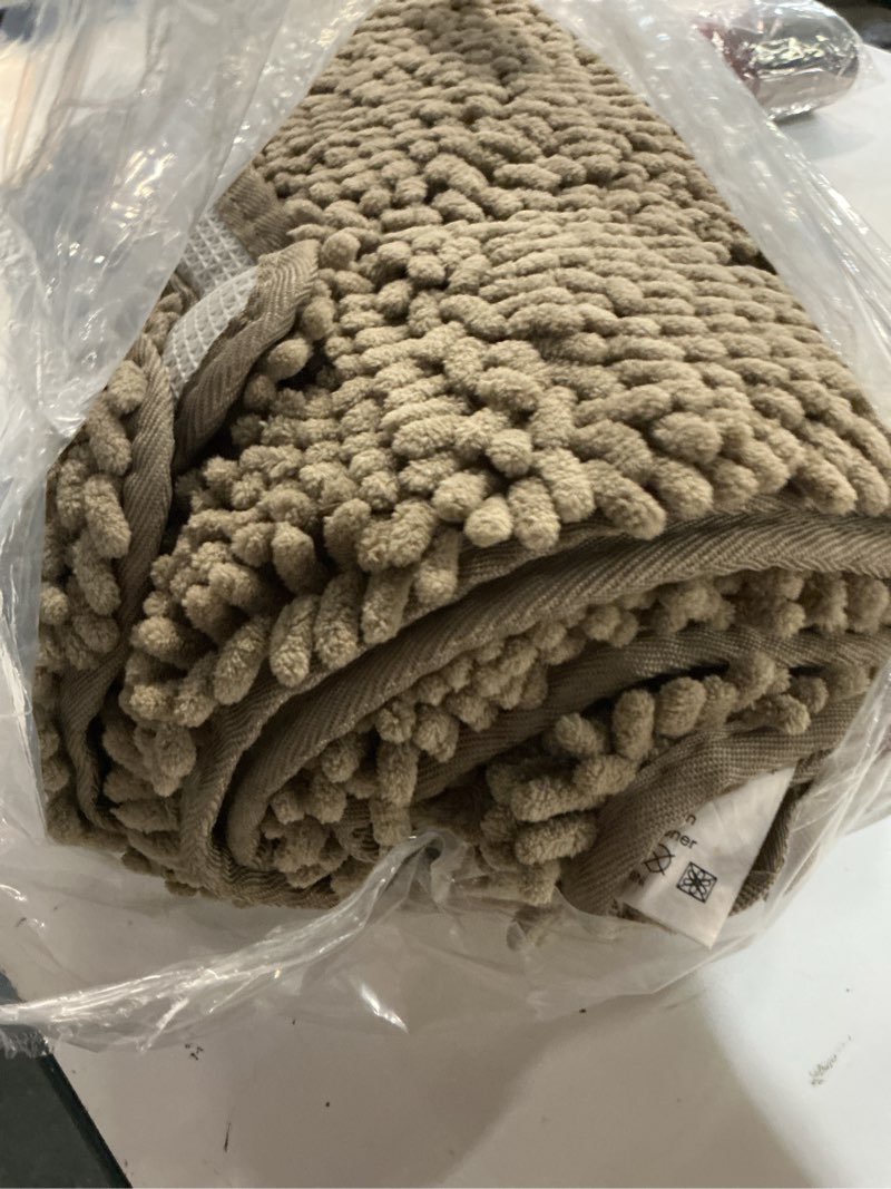 Condition photo showing Good Condition for bcoimo super absorbent dog door mat, 60"*24" anti slip mat for muddy paws, pet rugs for dirty paws washable that absorbs moisture and dirt, for dog cage and pet resting carpet beige with paw 60*24