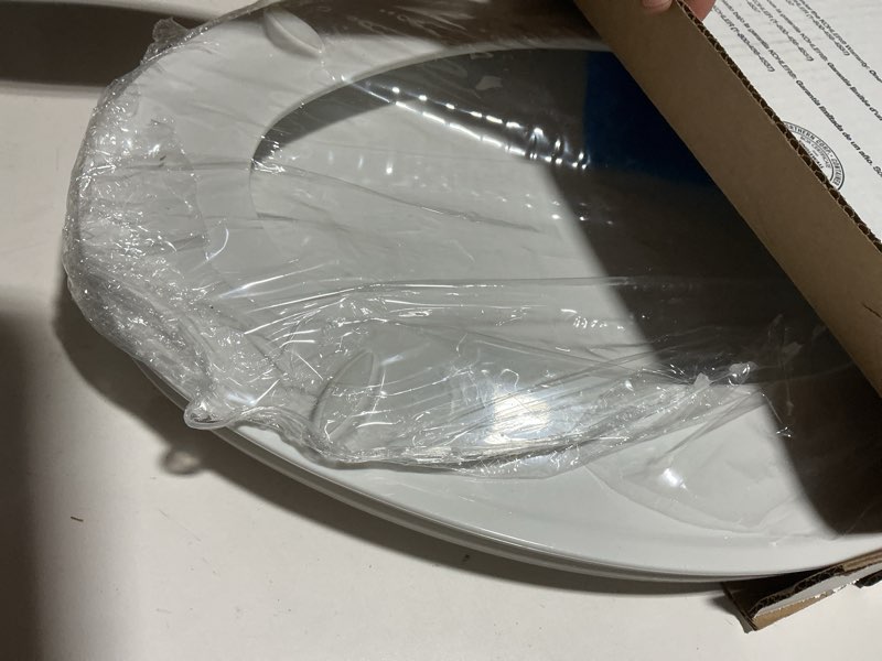 Condition photo showing As Is for kohler k-4774-0 brevia elongated white toilet seat with quick-release hinges and quick-attach hardware for easy clean, white