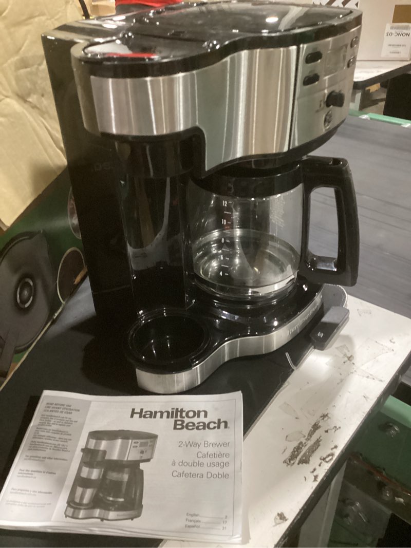 Condition photo showing As Is for (incomplete) hamilton beach 2-way programmable coffee maker, 12 cup glass carafe and single serve coffee maker, black with stainless steel accents, 49980rg 12 cup black