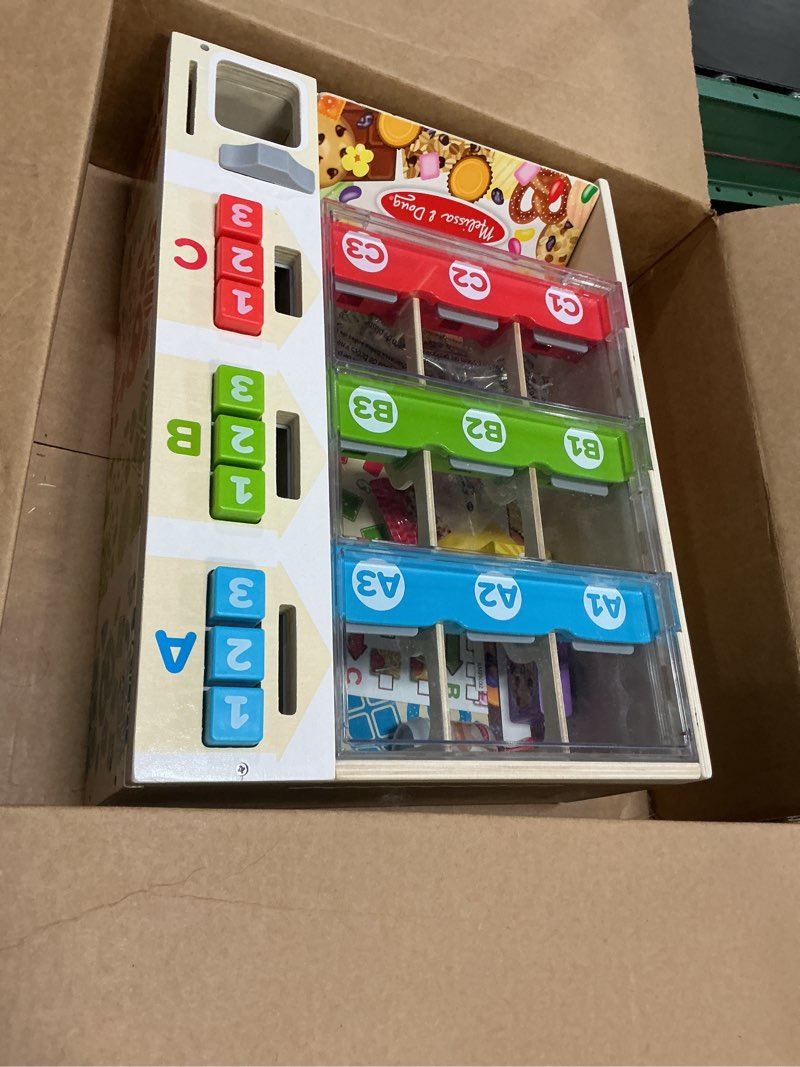 Condition photo showing item condition for Melissa & Doug Sort-Stock-Select Wooden Vending Machine Toy with Play Food, Mini Vending Machine Toys & Play Money, Preschool Toys for Kids Ages 3+