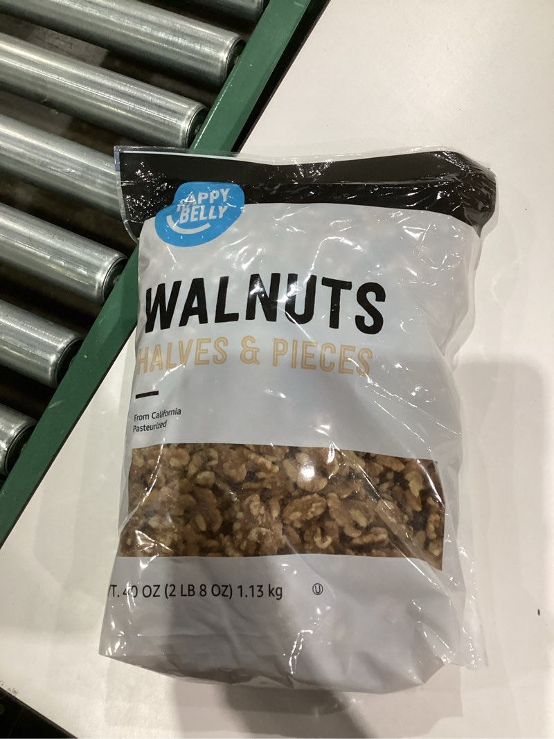 Condition photo showing New/Like New for Amazon Brand - Happy Belly California Walnuts Halves and Pieces, 40 ounce Walnuts Halves and Pieces 40 ounce