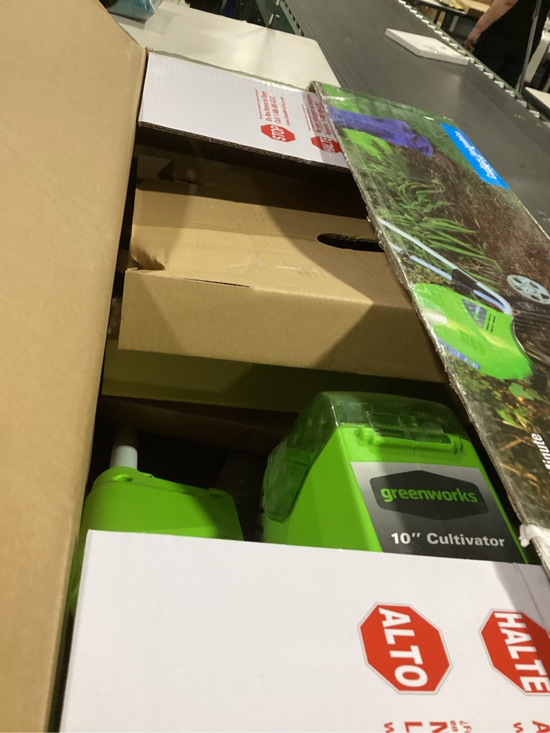 Condition photo showing As Is for greenworks 40v 10" cordless tiller / cultivator, 4.0ah battery and charger included, green 4ah battery and charger soil tiller cultivator