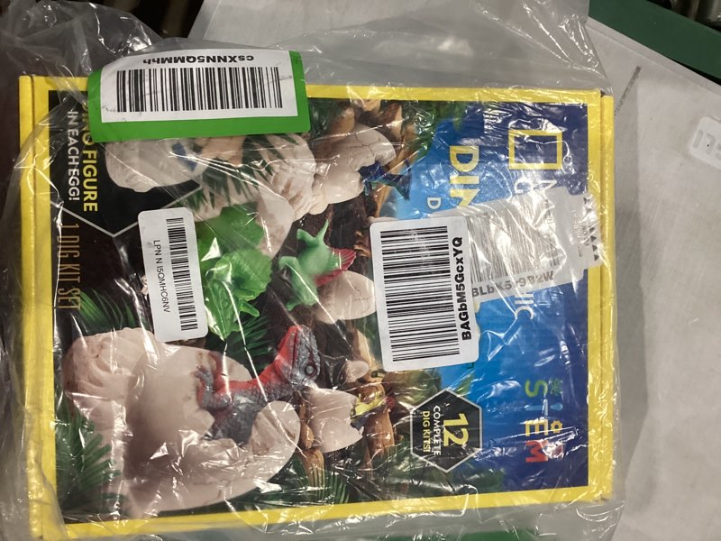 Condition photo showing Good Condition for National Geographic Dinosaur Dig Kit - 12 Dino Shaped Dig Bricks with Dinosaur Figures Inside & Excavation Tool Sets, Egg Hunt or Dig Party Activity, Great STEM Toy for Boys & Girls 12 Dino-shaped Dig Bricks