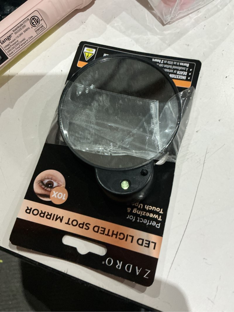 Condition photo showing As Is for zadro s 10x led lighted spot mirror with suction cups