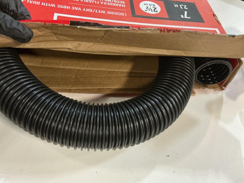 Condition photo showing As Is for craftsman cmxzvbe38763 2-1/2 in. x 7 ft. pos-i-lock wet dry vac hose attachment kit, industrial-grade shop vacuum replacement hose, fits most wet/dry vacuums with a 2-1/2 in. diameter 2-1/2 in. by 7 ft.