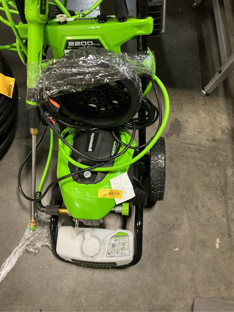 Condition photo showing As Is for greenworks 2200-psi 1.2-gpm cold water electric pressure washer with 4 spray tips