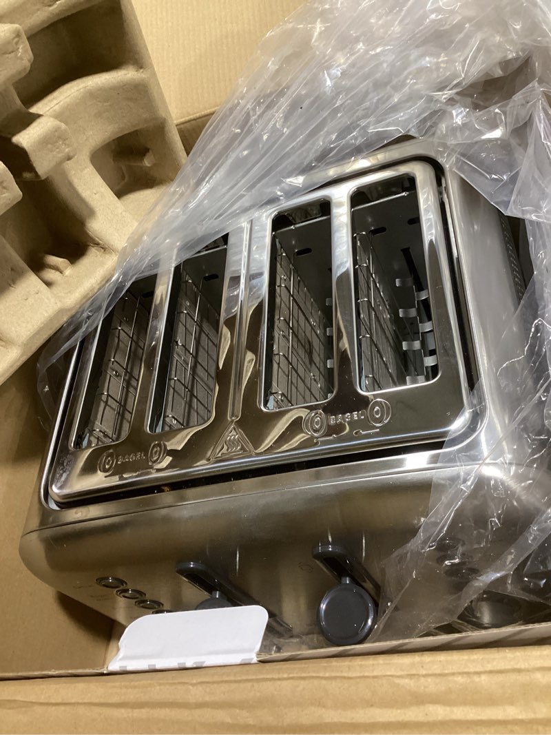 Condition photo showing Good Condition for buydeem dt640 4-slice toaster, 7 shade settings, extra wide 1.5’’ slots for bagel & english muffin, 6 toasting functions, retro stainless steel toaster with high lift lever, 1800w, silver 4-slice retro silver