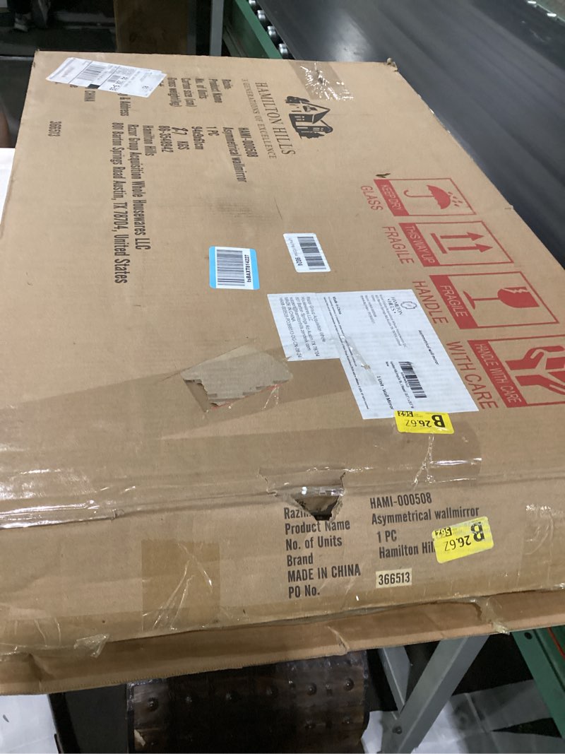 Condition photo showing As Is for hamilton hills irregular shaped wall mirror - asymmetrical accent mirror - modern wall mounted mirror - suitable for bedroom and living room - frameless shaped - 33.5" l x 20.5" w 33.5"l x 20.5"w silver-frameless