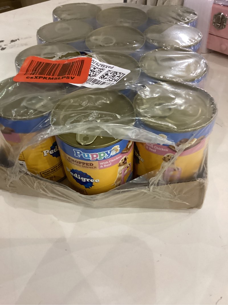 Condition photo showing item condition for 12pack) Pedigree Puppy Lamb & Rice Chopped Ground Dinner With Chicken & Beef Wet Puppy Food, (12) 13.2 oz Cans 
