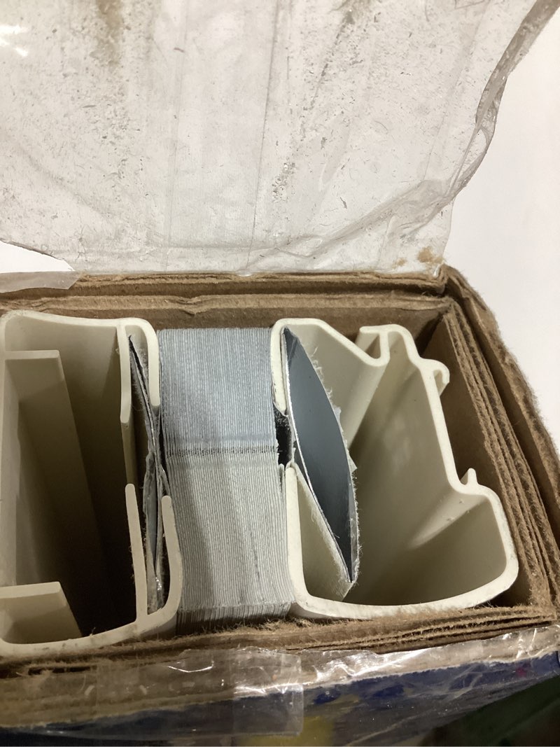 Condition photo showing As Is for levolor trim+go 67-in x 72-in ecru blackout cordless cellular shade