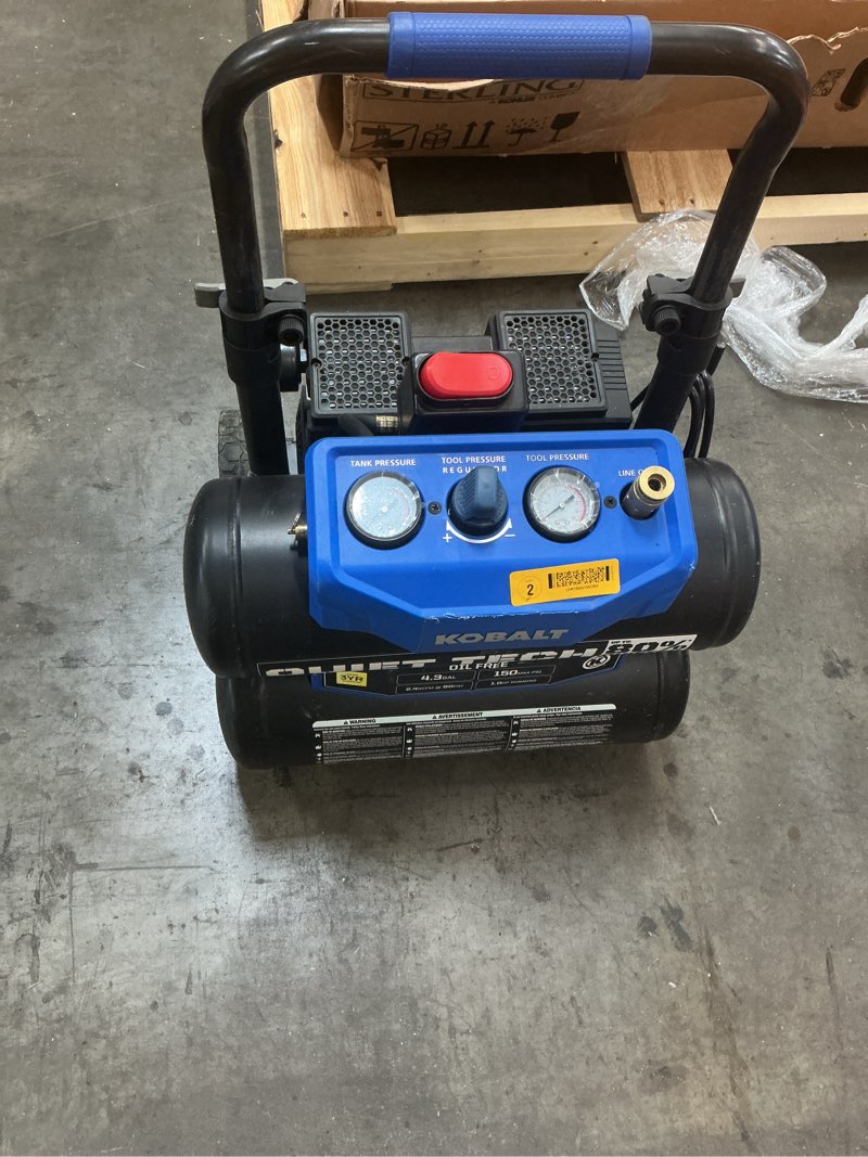 Condition photo showing As Is for kobalt quiet tech 4.3-gallon portable electric 150 psi twin stack air