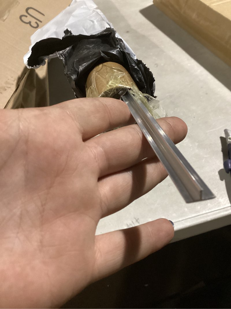 Condition photo showing Good Condition for uxcell 2.9ft x 0.39" t Molding Floor Transition Strips, Aluminium Alloy Vinyl Flooring Gap Trim for Joining Laminate Planks Tiles Floor Gaps, Silver 2.9Ft x 0.39" Silver 1