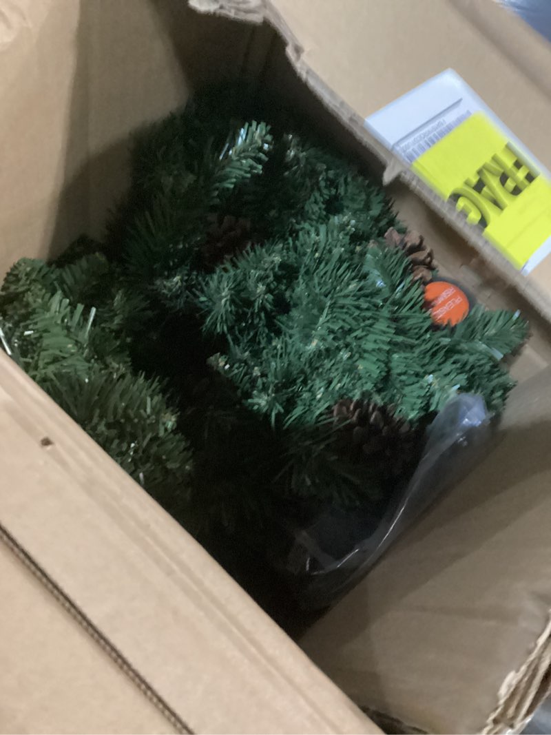 Condition photo showing New/Like New for Decoway 6FT Artificial Christmas Tree: Unlit Green Xmas Pine with Pinecones and Metal Stand for Indoor - Holiday Decoration for Porch Living Room Easy Assembly