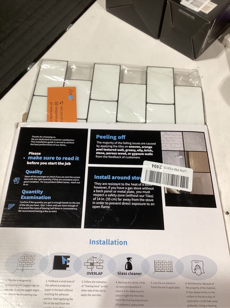 Condition photo showing As Is for Art3d 10-Sheet Backsplash Tile for Kitchen Peel and Stick, 12"x12" Stick on Subway Tiles for Kitchen, Bathroom Back Splashes, White-Black Grout White-black Grout 12x12 Inch - 10 pcs