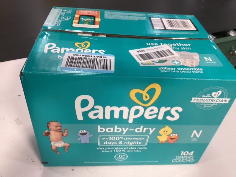 Condition photo showing New/Like New for Pampers Diapers - Baby Dry - Size 0, 104 Count, Absorbent Disposable Newbort Diaper (Packaging May Vary) Newborn 104