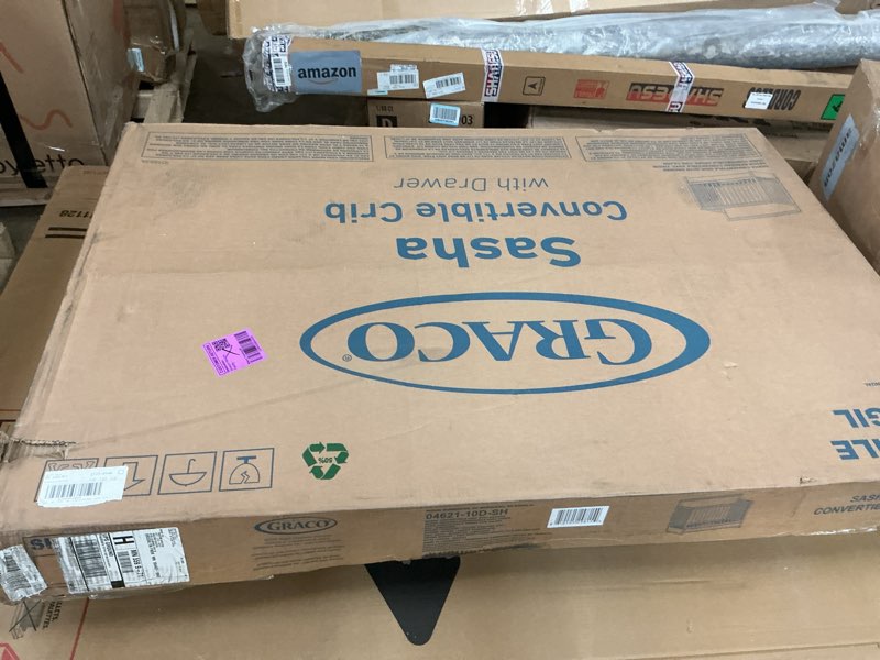 Condition photo showing New/Like New for graco sasha 5-in-1 convertible crib with drawer - frosted oat