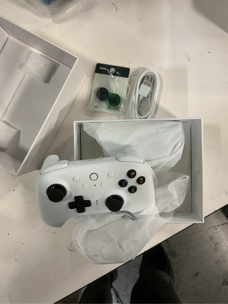 Condition photo showing New/Like New for 8bitdo ultimate 2 wireless gaming controller with tmr joysticks, switchable hall effect/tactile triggers, 8speed wireless tech, charging dock, rgb fire ring for pc & android - white ultimate 2 wireless white