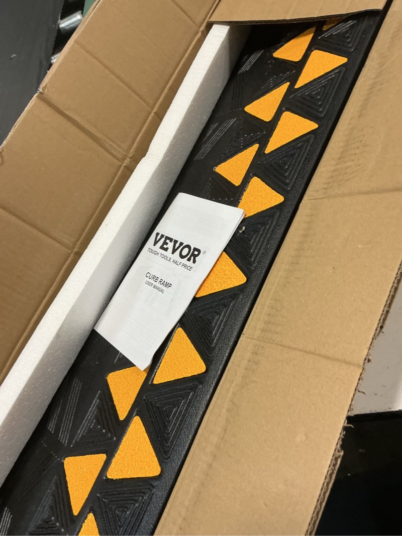 Condition photo showing Good Condition for vevor rubber curb ramp 3.5" rise height sidewalk curb ramp, 10" width 39.4" length driveway ramp for curb, 15t heavy duty rubber for forklifts, trucks, buses, cars, wheelchairs, bikes 3.5" h