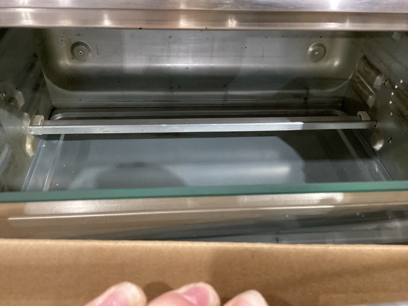 Condition photo showing As Is for black+decker to3250xsbd 8-slice extra wide convection countertop toaster oven, includes bake pan, broil rack & toasting rack, stainless steel/black