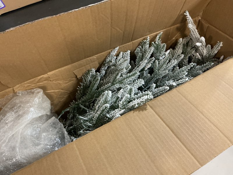 Condition photo showing Good Condition for Puleo International 3ft Pre-Lit Potted Flocked Arctic Fir Christmas Tree with 40 Warm White Lights, 303 Realistic Dense Snow Flocked Branch Tips, Easy Setup Artificial Trees with Sturdy Stand 3' Flocked Arctic Fir with 40 White Lights