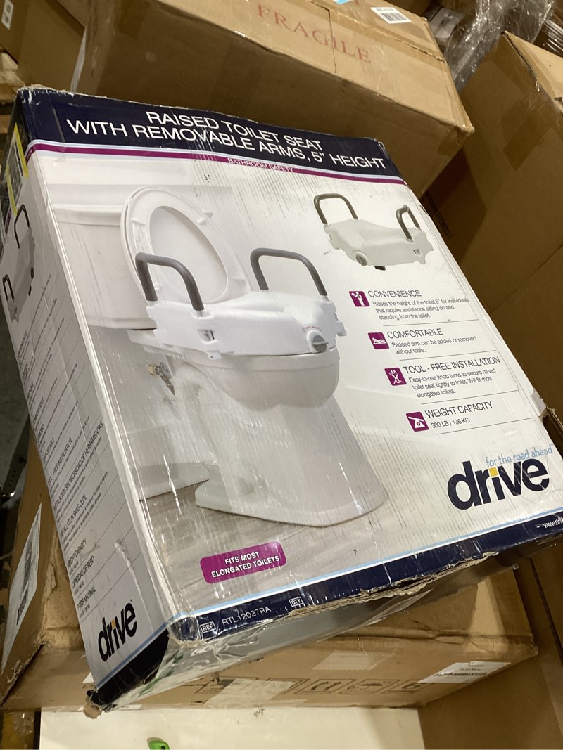 Condition photo showing As Is for Bath SafetyRaised Toilet Seat Product Description: Elev.Toilet Seat w/ RemArms,RTL,1 EA