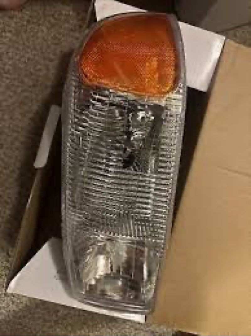 passenger side headlight and turn signal assembly for a 1999-2006 GMC Sierra, Yukon, or Chevrolet Silverado