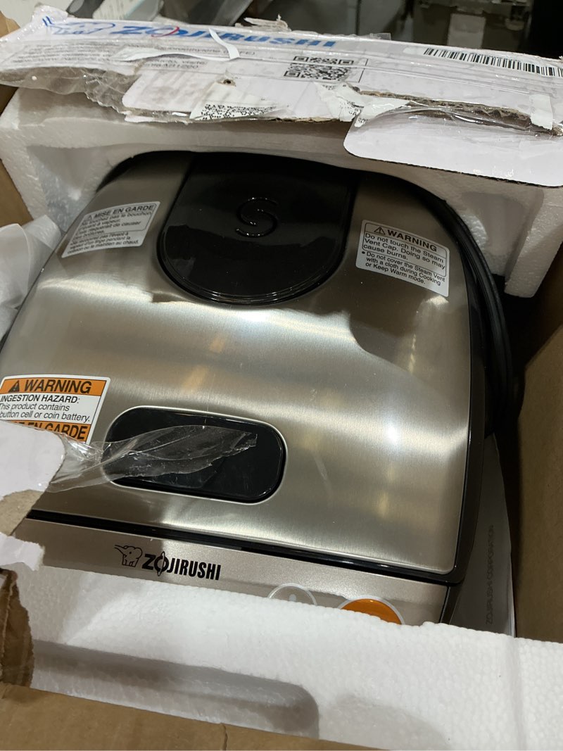 Condition photo showing As Is for zojirushi micom 3-cup compact size, multiple settings, stainless steel made, built-in retractable power cord and easy to transport rice cooker and warmer