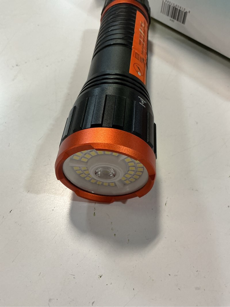 Condition photo showing As Is for ozark trail 1500 lumen rechargeable flashlight, long-lasting and durable