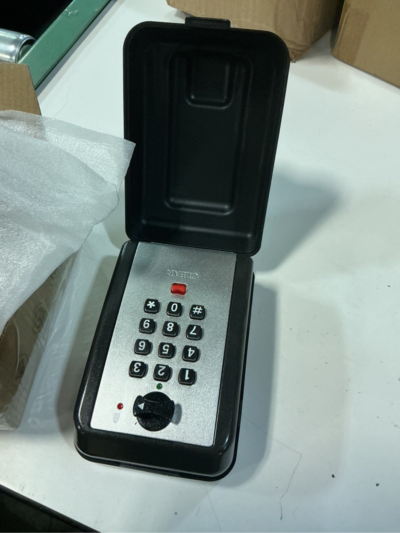 Condition photo showing New/Like New for wall safe key lock box, 12 digit combination lock box for keys with resttable code, large capacity & weatherproof outdoor lockbox, spare key safe storage lock box for home, office, garage 12-digit