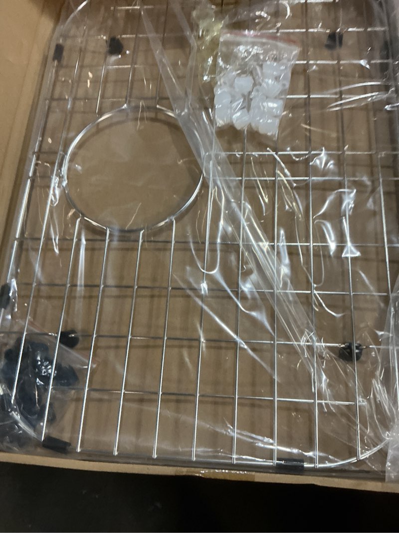 Condition photo showing New/Like New for serene valley sink bottom grid 19-1/16" x 13-5/8”, rear drain with corner radius 3-1/2", sink protector nlw1914r
