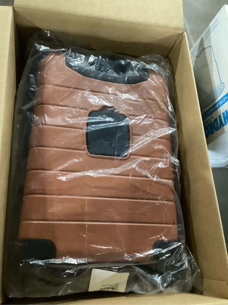 Condition photo showing Good Condition for wrangler smart spinner hardside luggage, 22-inch carry-on, burnt orange carry-on only burnt orange