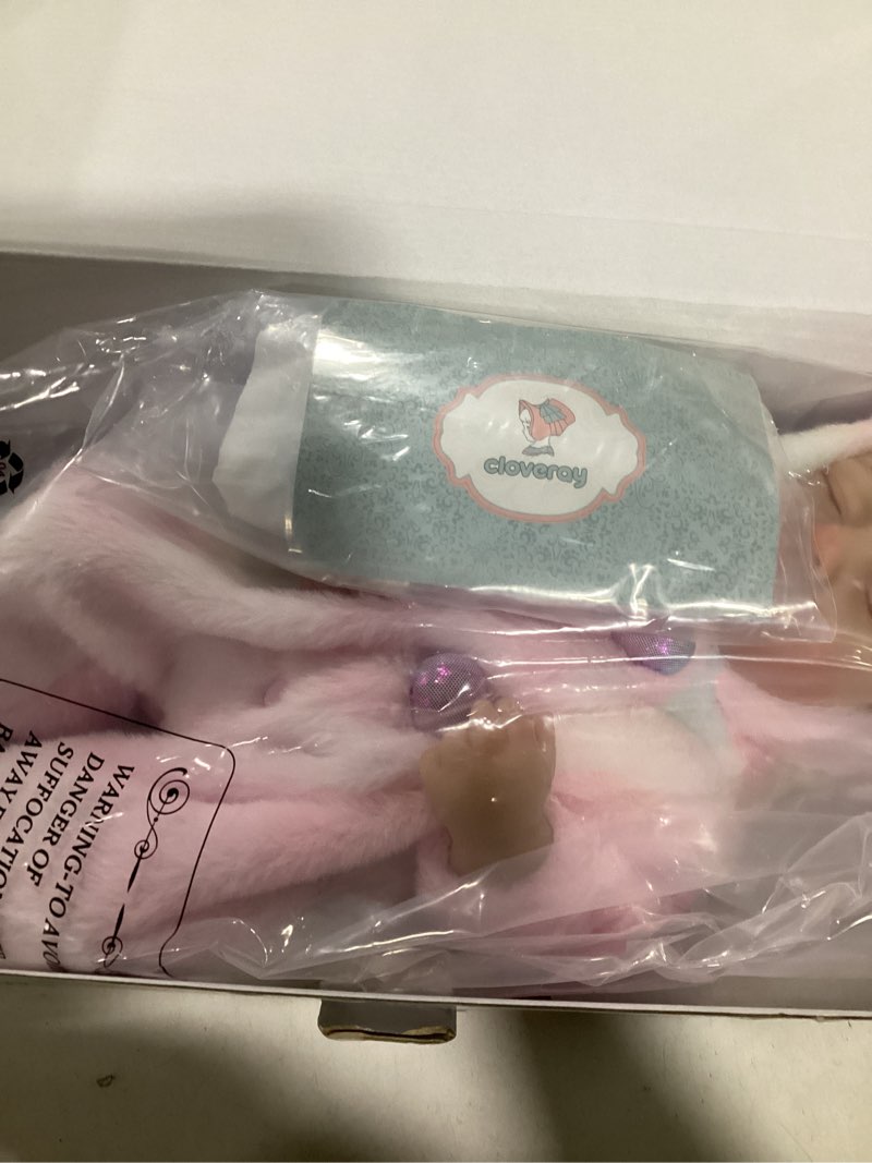Condition photo showing As Is for reborn baby dolls – 20 inch real baby dolls that look real, full body vinyl girl doll in fantasy horn outfit with accessories, gift for girls ages 3+, pretend play & collectors dreamy pink