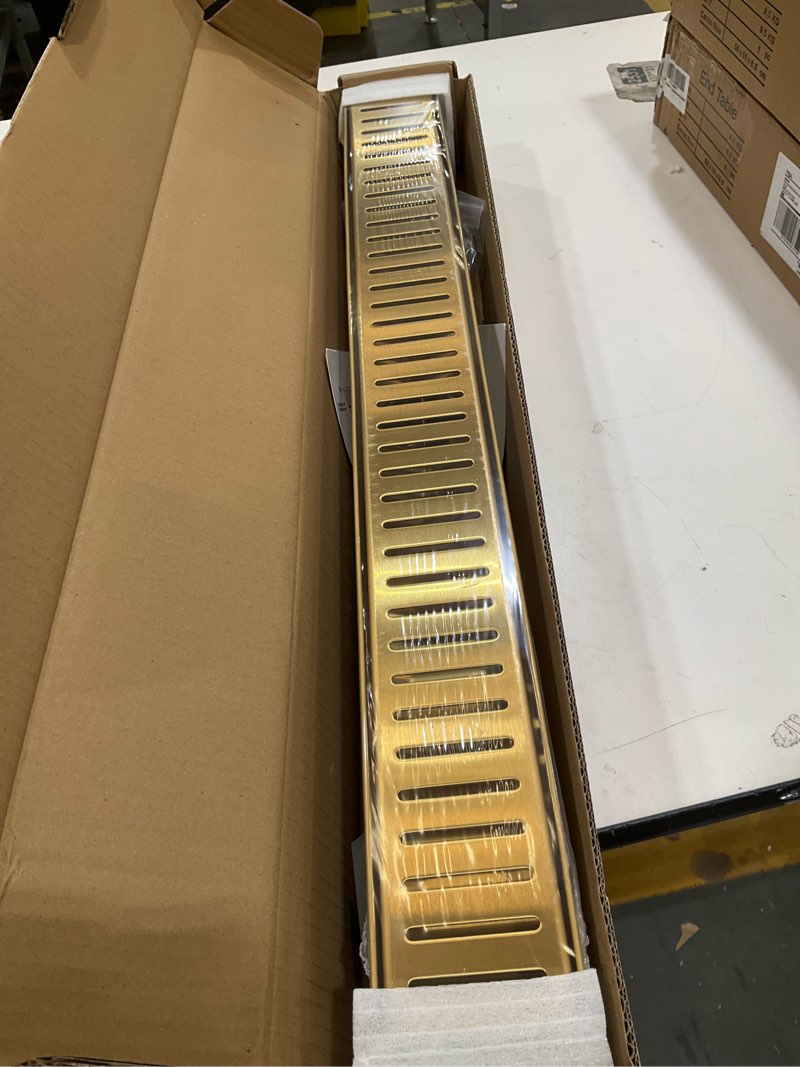 Condition photo showing Good Condition for htoh gold shower drain, 304 stainless steel linear shower drain 24 inch with removable capsule pattern grate - adjustable rectangular brushed shower floor drain with hair strainer, linear drain brushed gold 24 inch