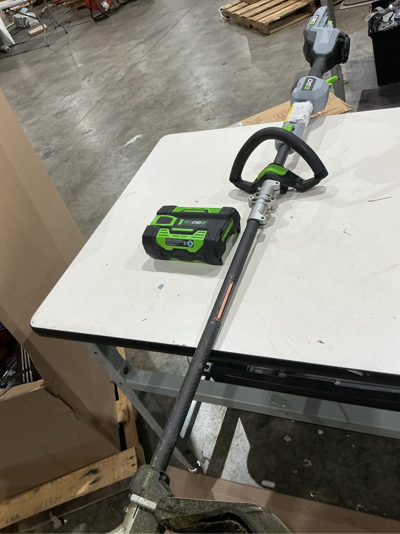 Condition photo showing As Is for ego power + powerload with line iq 56-volt 16-in telescopic shaft battery string trimmer 4.0 ah (battery included) (charger included)