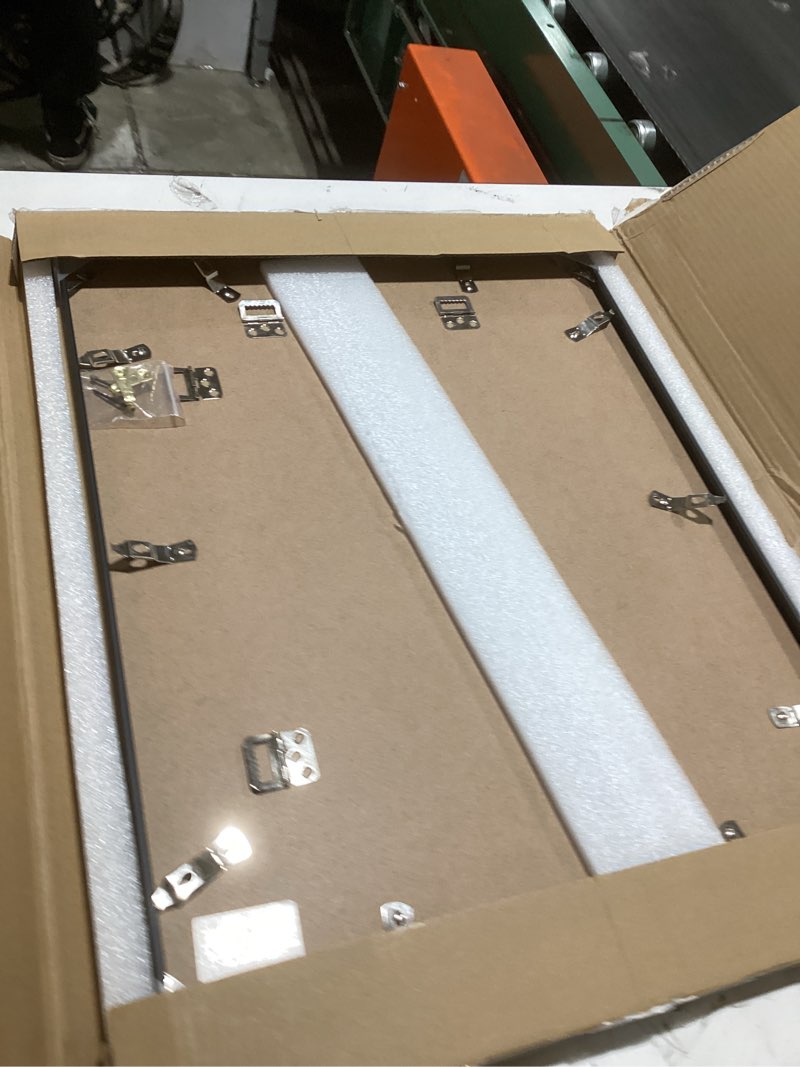 Condition photo showing Good Condition for vivelove 17x22 metal picture frame, black aluminum picture frames with tempered glass, wall mounting horizontally or vertically, for hanging diploma, certificates and decor for wall-1pack 17x22-1p black