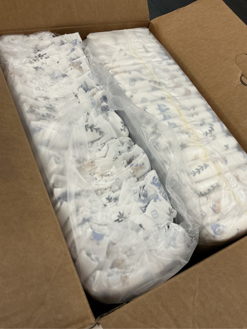 Condition photo showing As Is for millie moon luxury diapers, size 5, 58 count