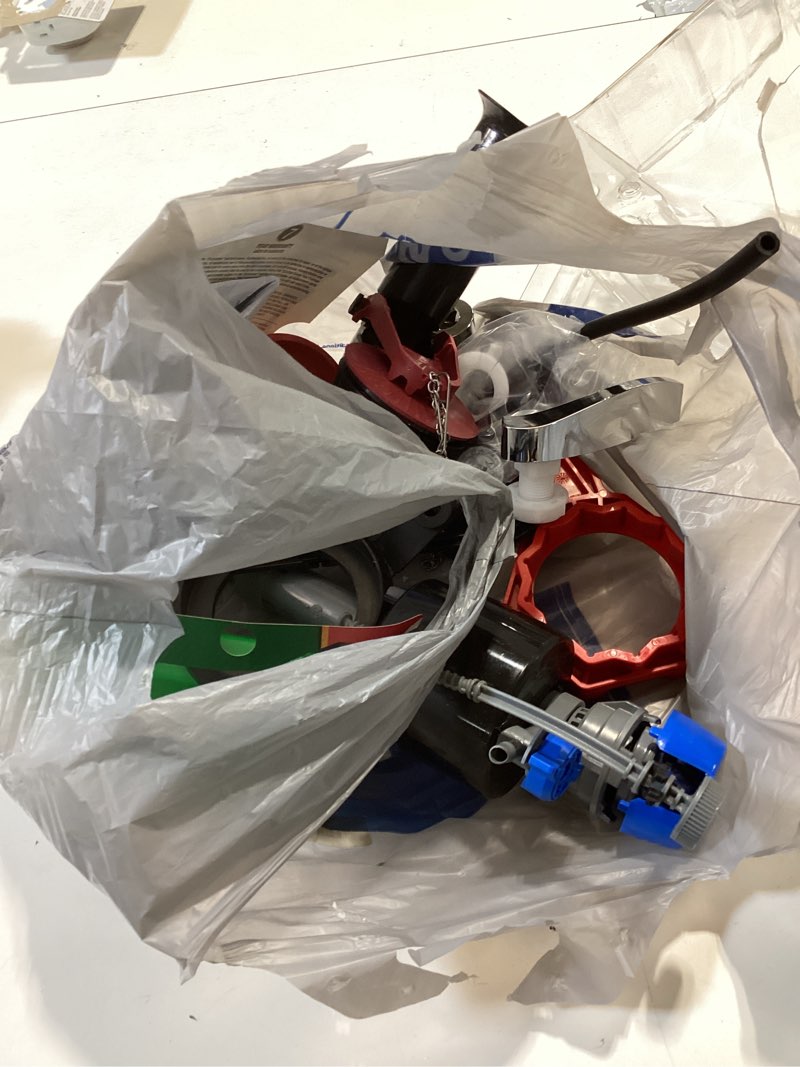 Condition photo showing As Is for fluidmaster universal toilet repair kit