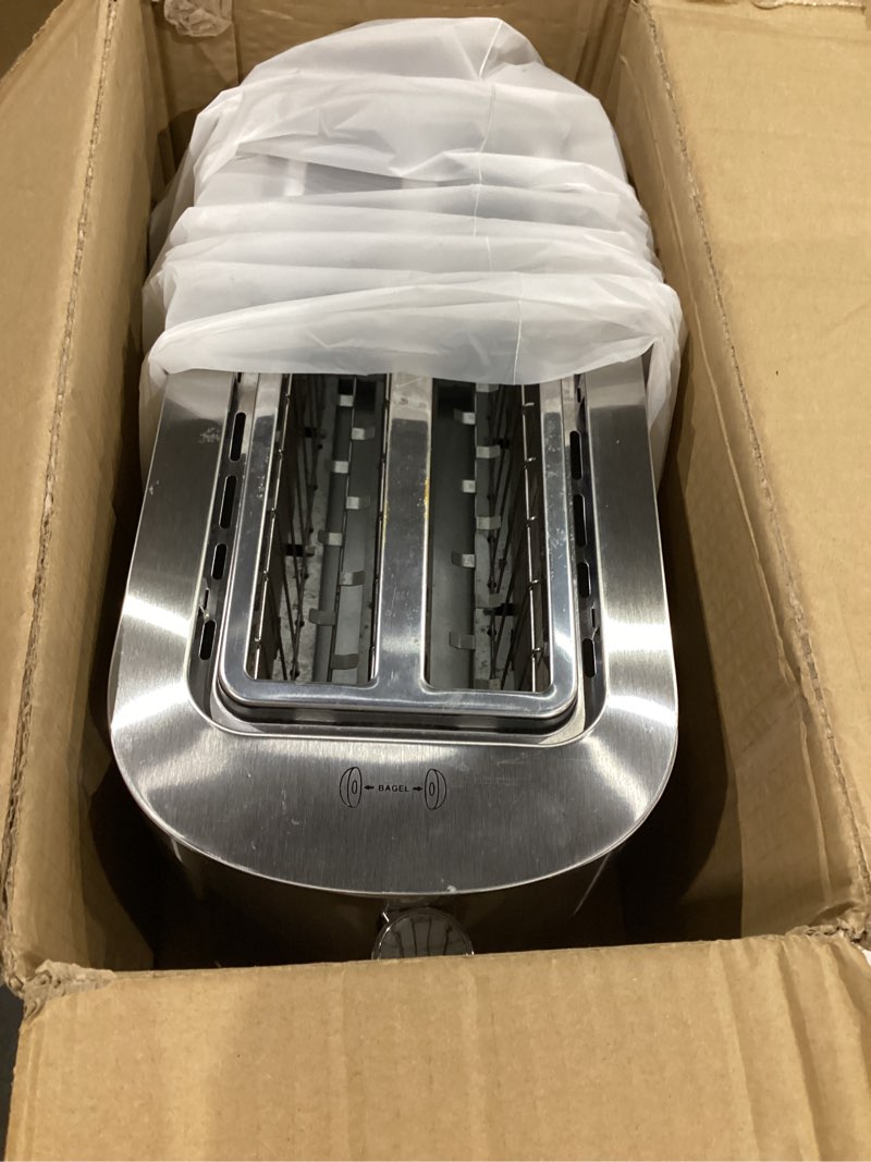 Condition photo showing As Is for elite gourmet ect-3100 4-slice long slot toaster | extra wide slots for bagels, sourdough & texas toast | 6 browning settings | reheat, defrost & cancel | built-in warming rack | stainless steel 4 slice black/stainless steel
