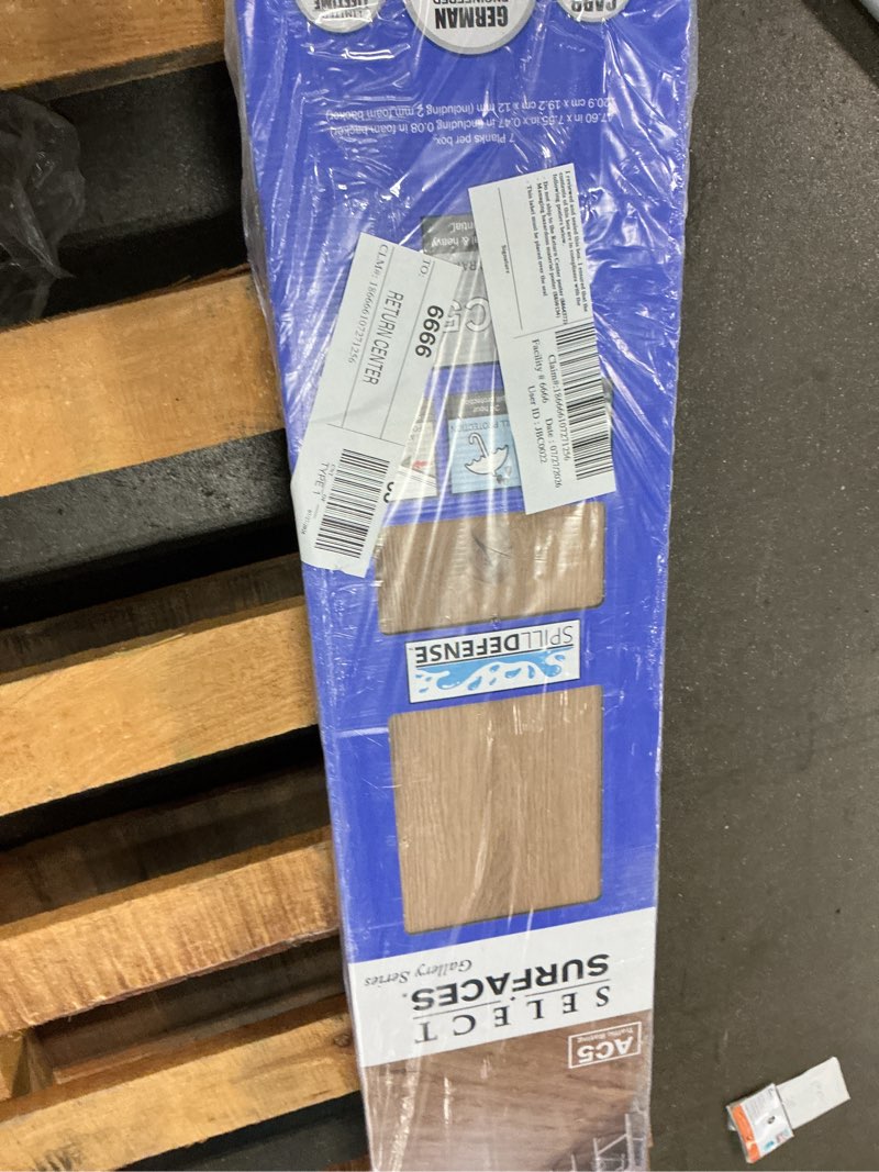 Condition photo showing As Is for select surfaces victoria spilldefense laminate flooring, 17.49 sq. ft. per box