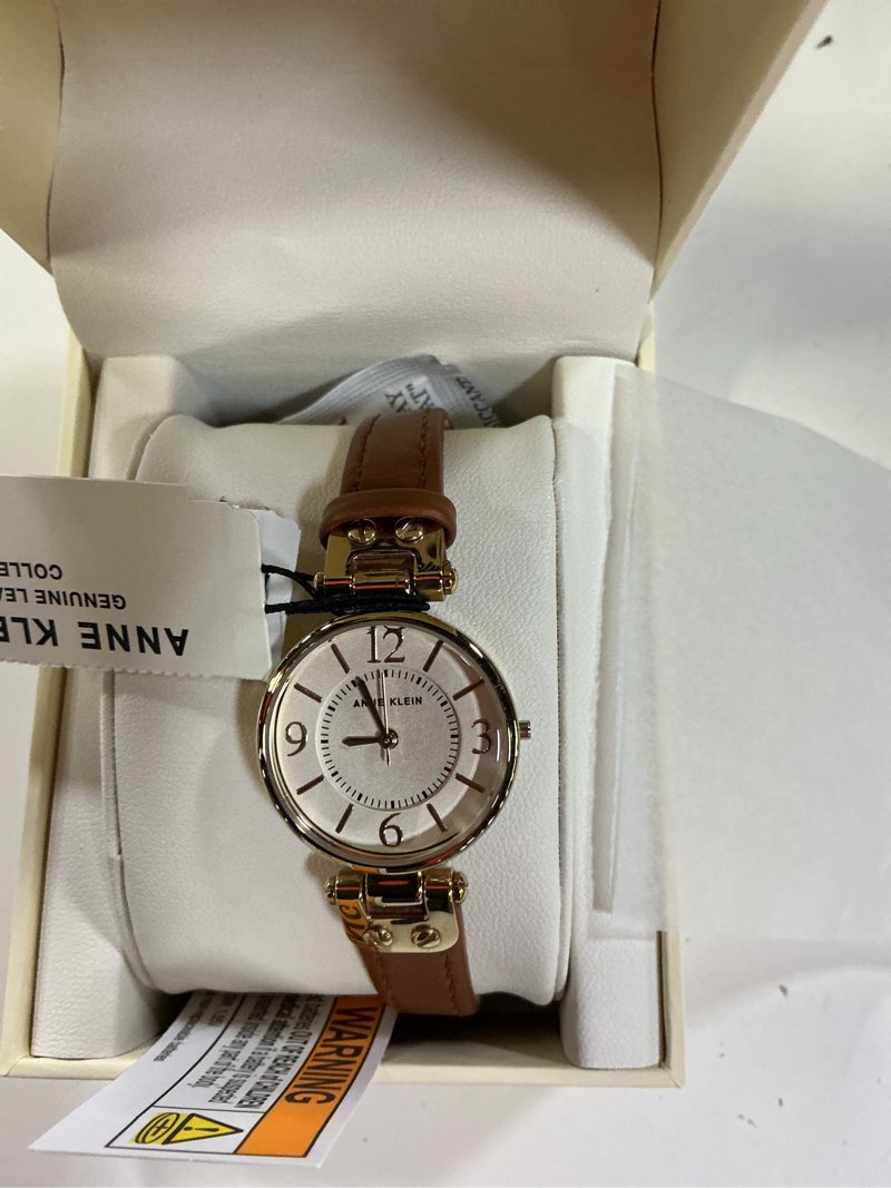 Condition photo showing New/Like New for anne klein women's leather strap watch brown/gold