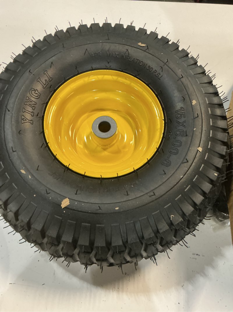 Condition photo showing Good Condition for dump cart tires and rim
