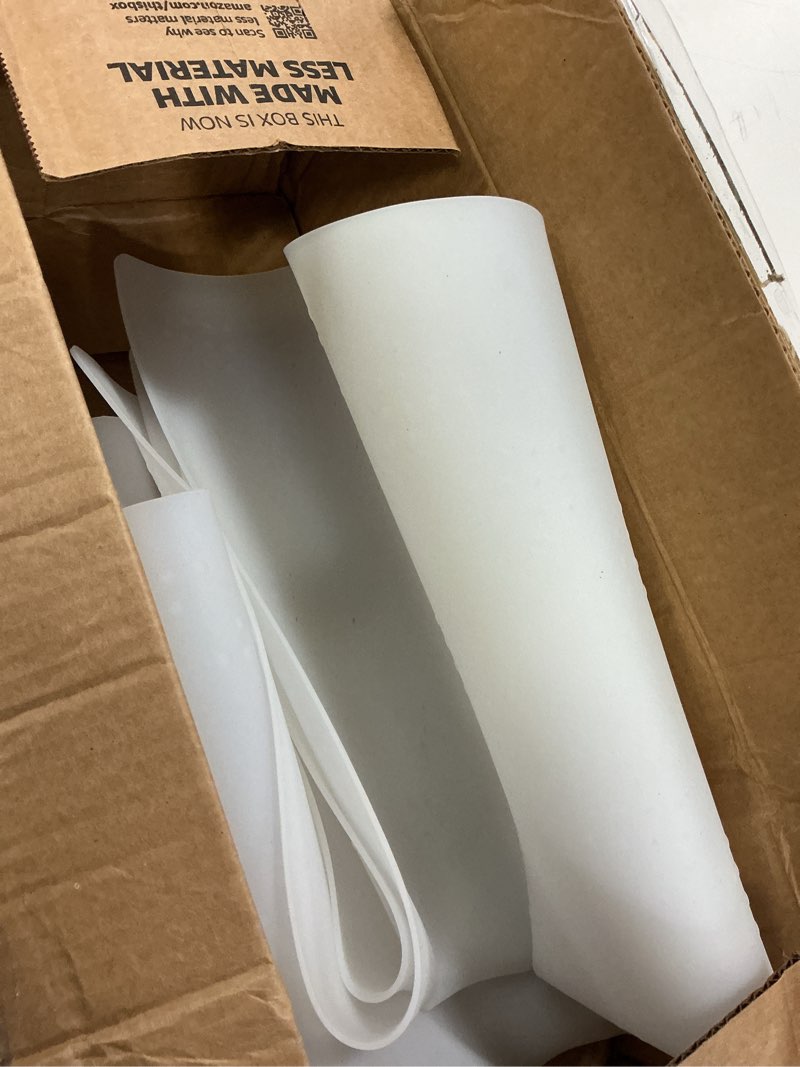 Condition photo showing As Is for AECHY Silicone Mats for Kitchen Counter 47"x23.6"x0.08”, Largest Heat Resistant Mat Shipped Rolled Up Kitchen Island Silicone Countertop Protector Mat Nonslip Extra Large Counter Mat, Translucent 47"L x 23.6"W Translucent