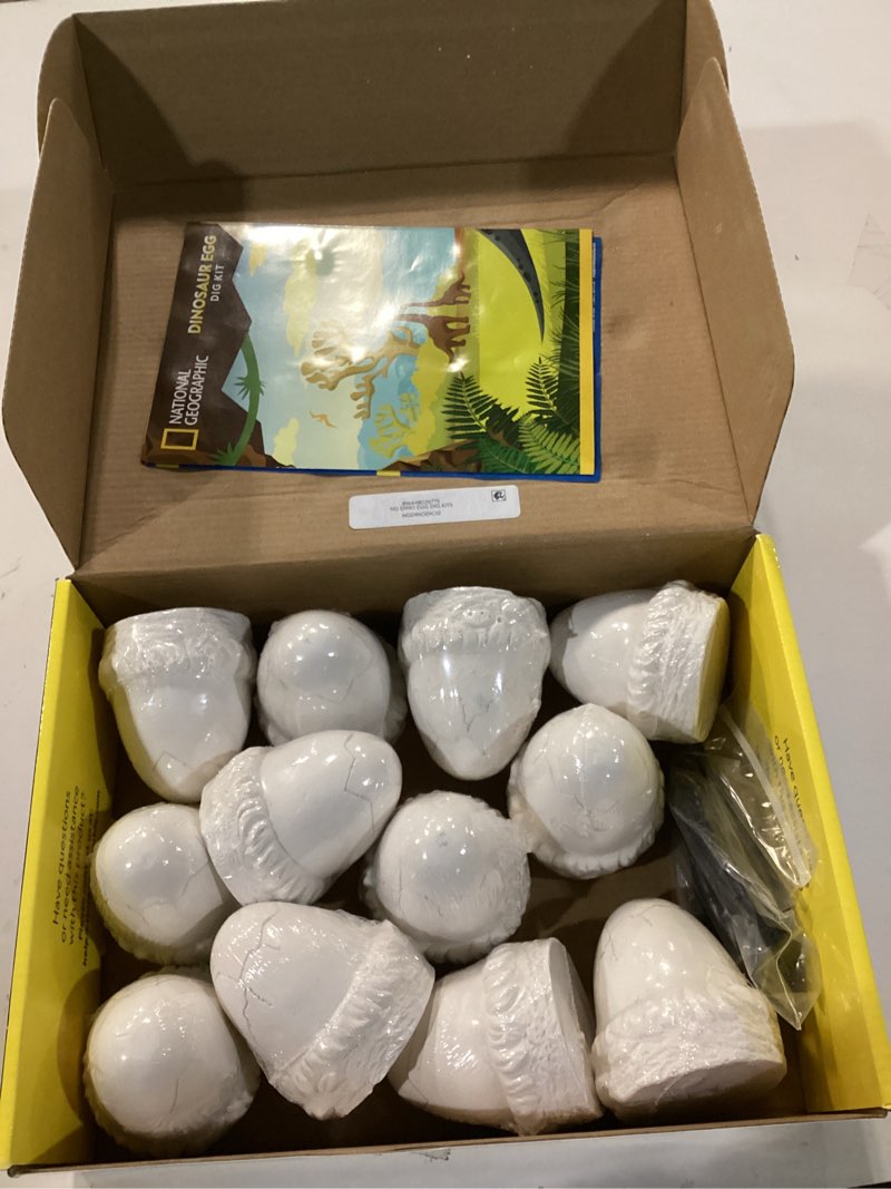 Condition photo showing New/Like New for National Geographic Dinosaur Dig Kit - 12 Dino Shaped Dig Bricks with Dinosaur Figures Inside & Excavation Tool Sets, Egg Hunt or Dig Party Activity, Great STEM Toy for Boys & Girls 12 Dino-shaped Dig Bricks