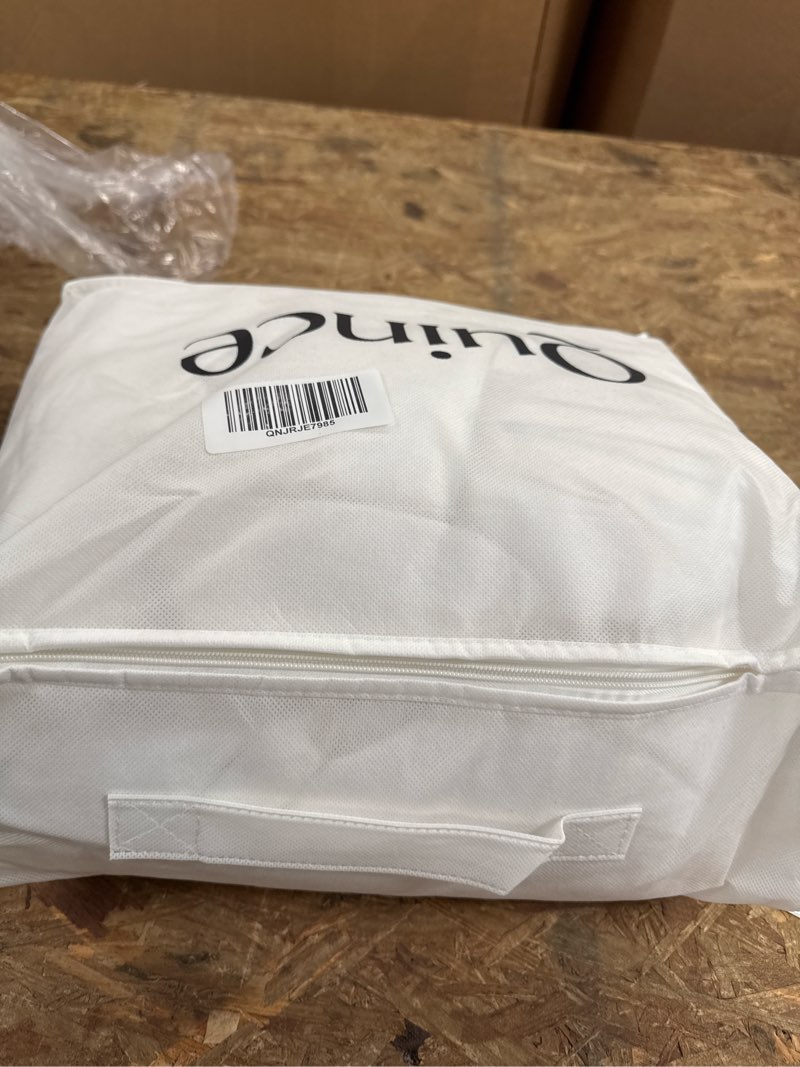Condition photo showing Good Condition for lightweight premium down comforter, twin, down
