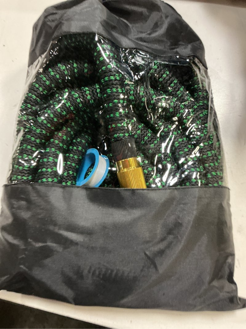 Condition photo showing As Is for 50 ft flexible garden hose with 10 spray nozzle-heavy duty superior strength 96d material garden hos