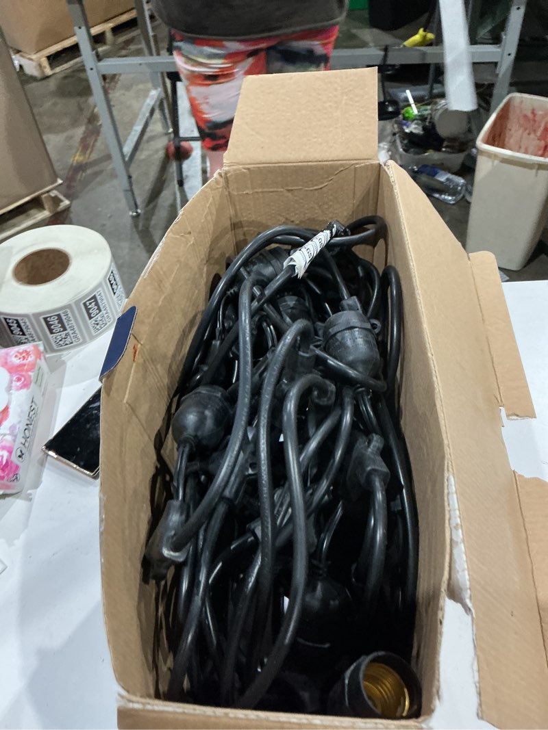 Condition photo showing As Is for  harbor breeze 48-ft plug-in black indoor/outdoor string light with 24 white -light led edison bulbs