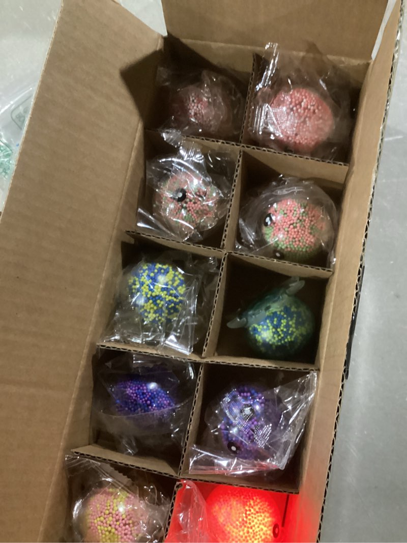 Condition photo showing Good Condition for Neliblu Squishy Octopus Balls - Jumbo Mochi Squishy Toys - Easter Basket Stuffers for Teens - Glow-in-The-Dark - Stress Balls for Kids and Adults - 2.3x1.8x1.7 inches (Multicolor) Set of 10 Set of 10 (Squishy Octopus)