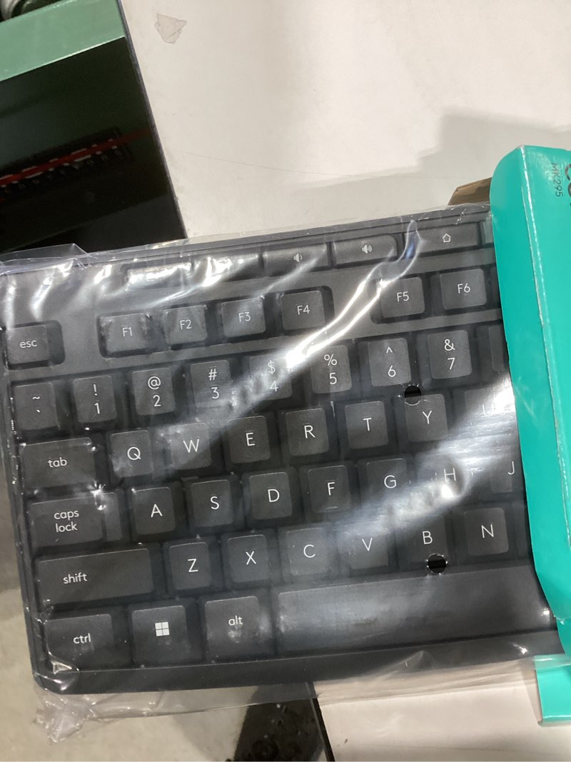 Condition photo showing New/Like New for logitech mk295 wireless mouse & keyboard combo with silenttouch technology, full numpad, advanced optical tracking, lag-free wireless, 90% less noise - graphite